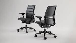 Key ergonomic features of an adjustable office chair, including lumbar support and seat height