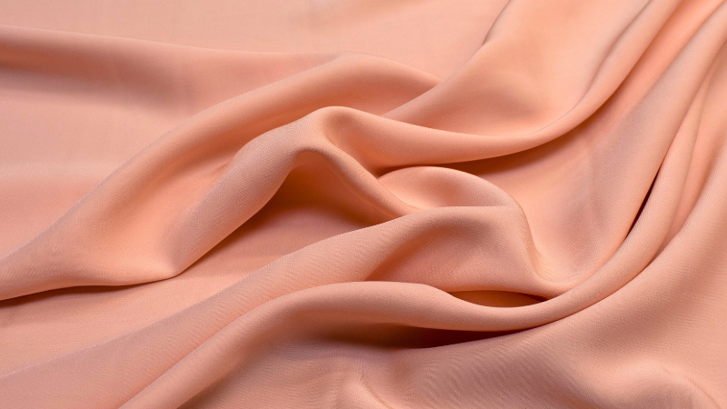 An image of a light pink viscose fabric