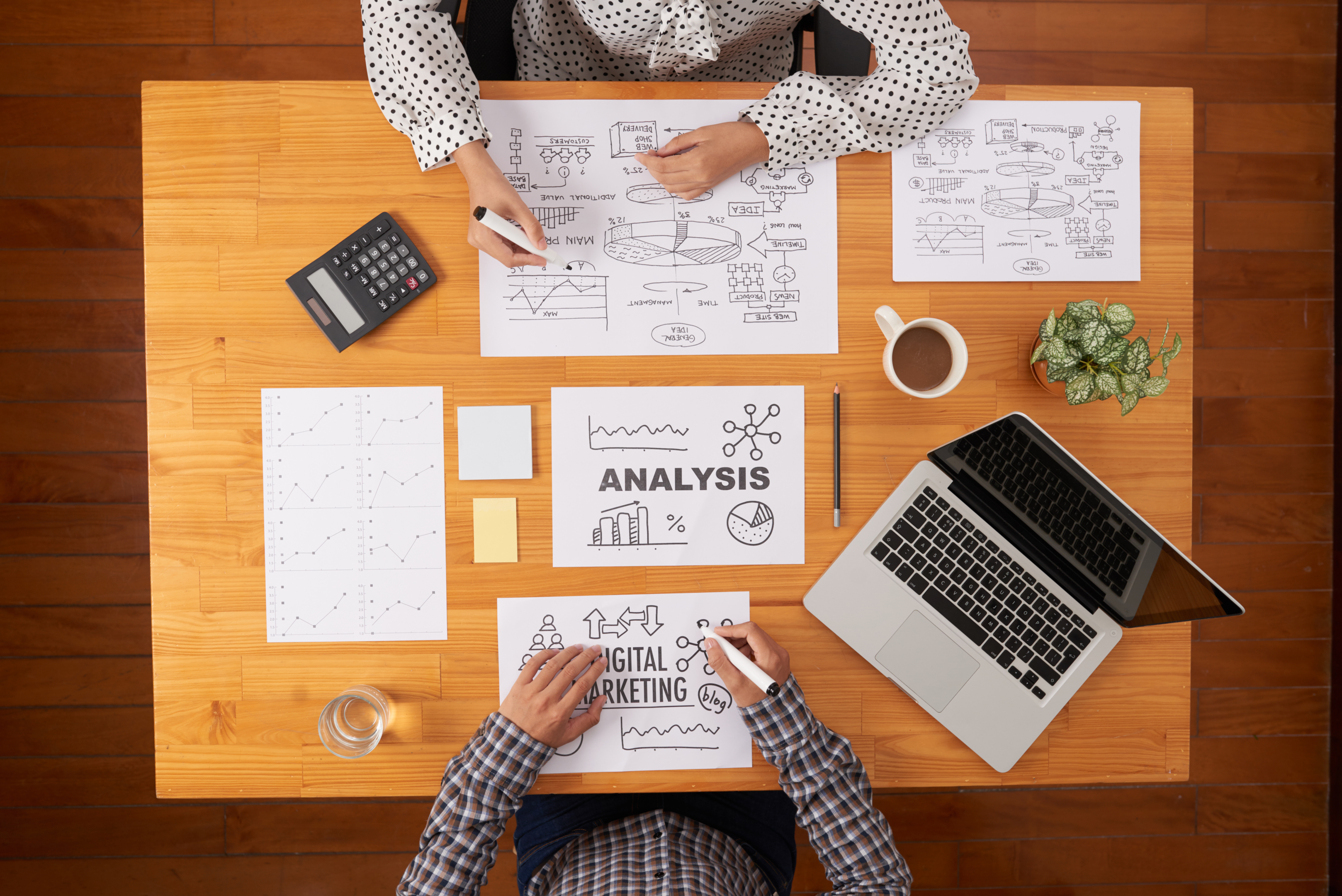 table covered in marketing strategy notes 