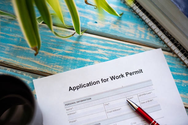 An illustrated step-by-step guide to applying for a Canada work permit, featuring checklists and application forms.