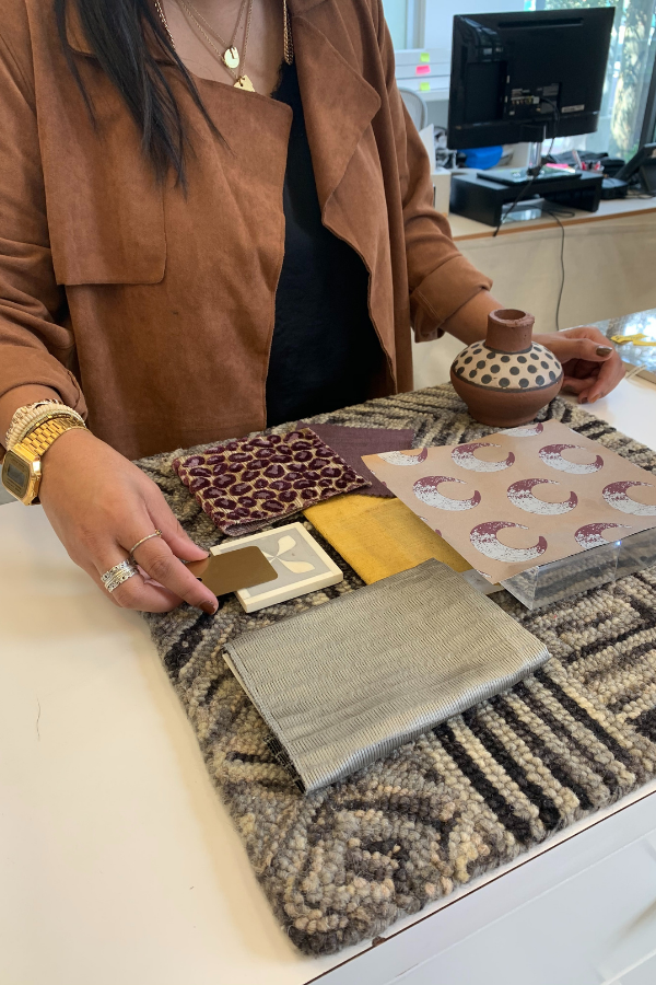 a designer working on mood boards