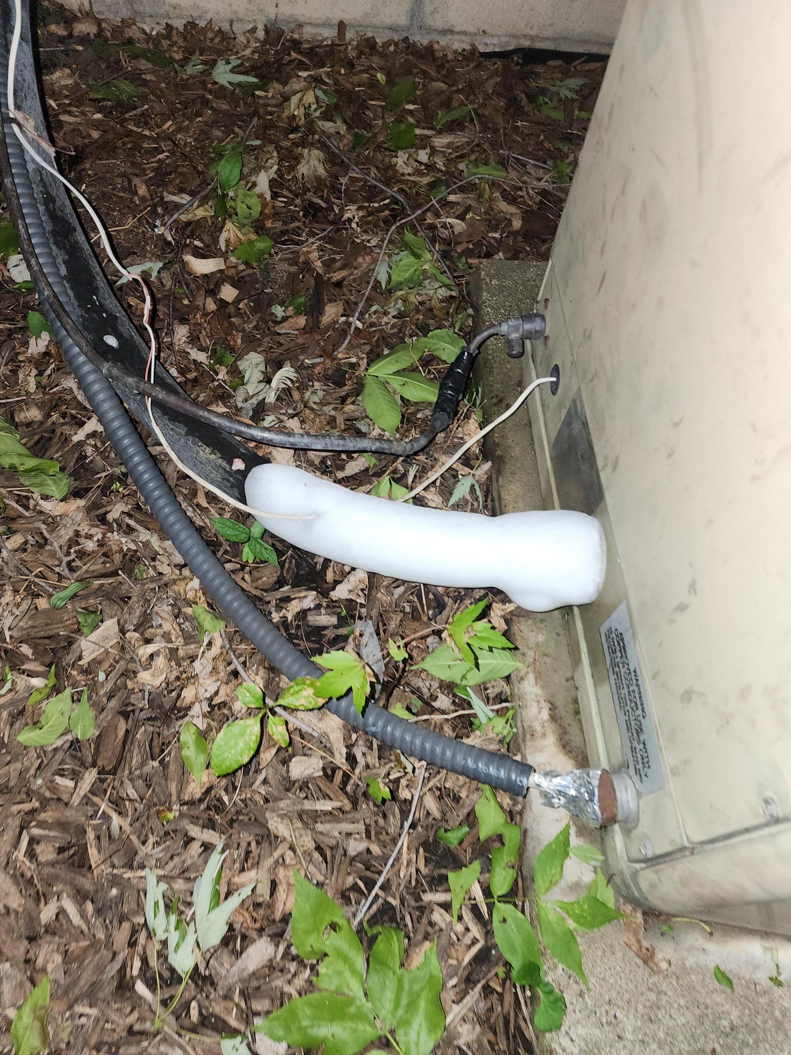 Frozen AC refrigerant line on outdoor condenser unit in Allen TX