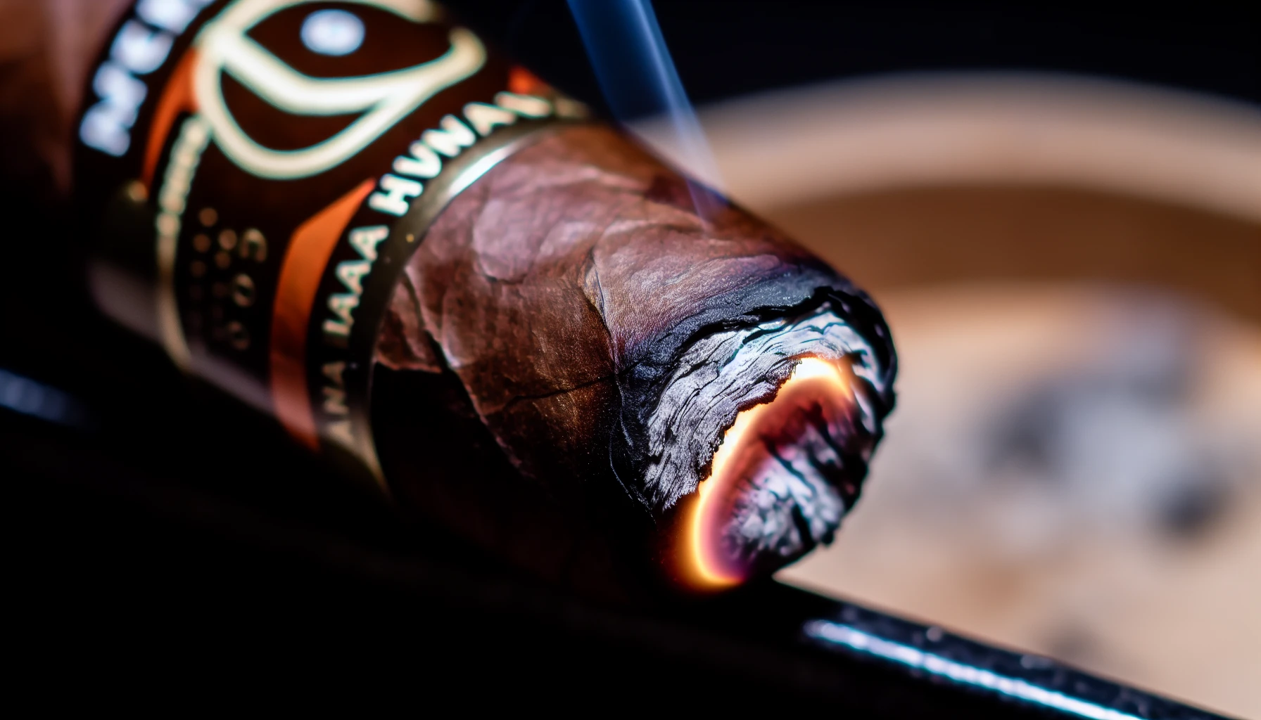 A close-up of a lit Tatuaje Havana VI Verocu cigar, showcasing the burn line