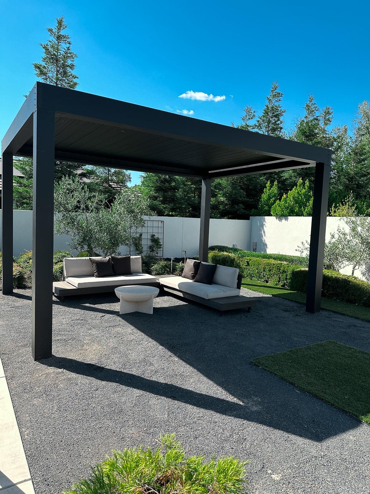 Landscaping and hardscaping can really help a pergola standout in your outdoor living space.