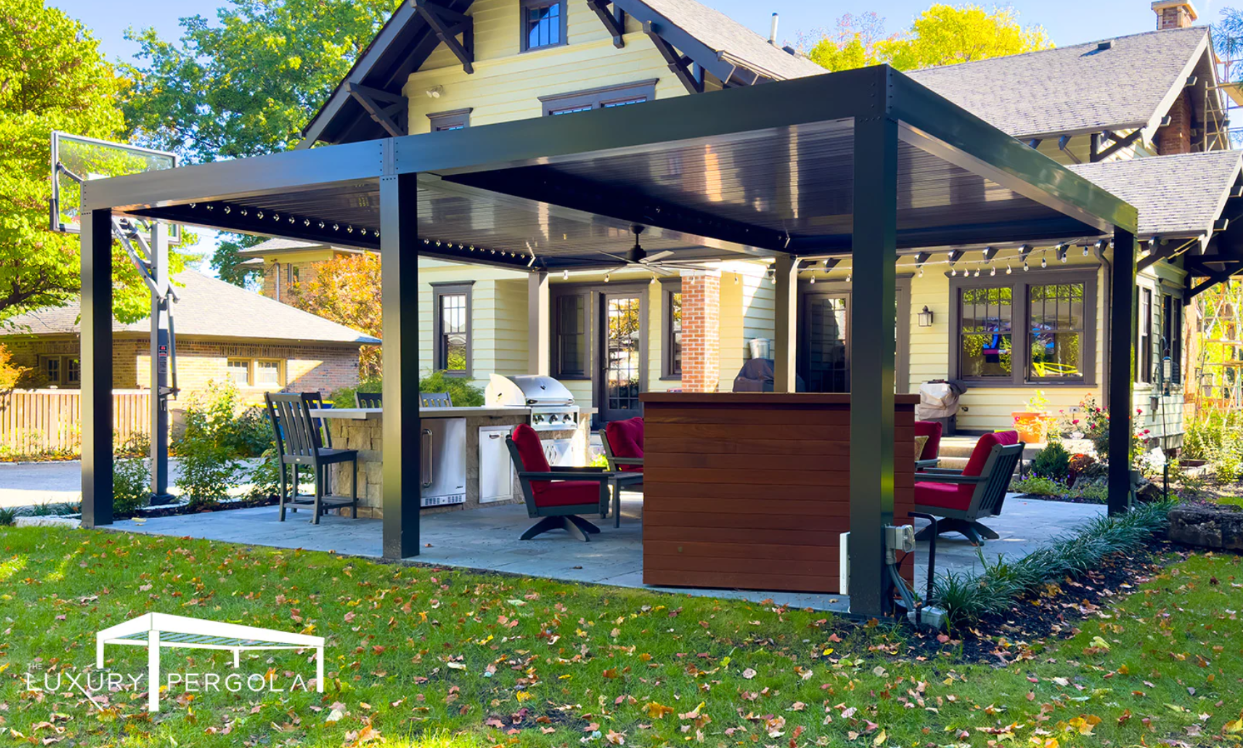 24x20 Large pergola in outdoor area giving cover shade to an outdoor kitchen and outdoor dining area.