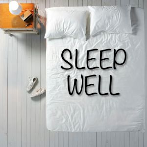 Image of a calming bedroom with the text "sleep well".