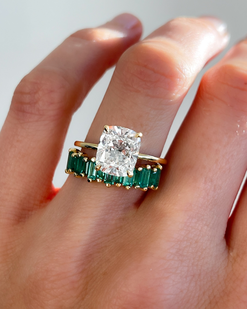 WEDDING BAND WITH GREEN EMERALD BAGUETTES PAIRED WITH CUSHION CUT SOLITAIRE