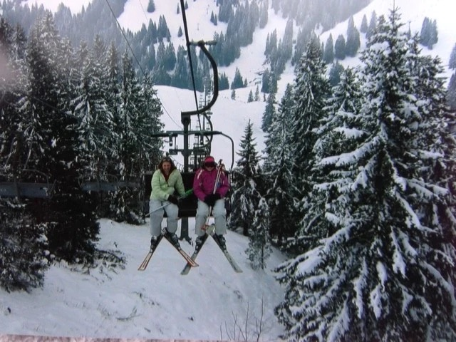 cable car in the western alps with snow in background