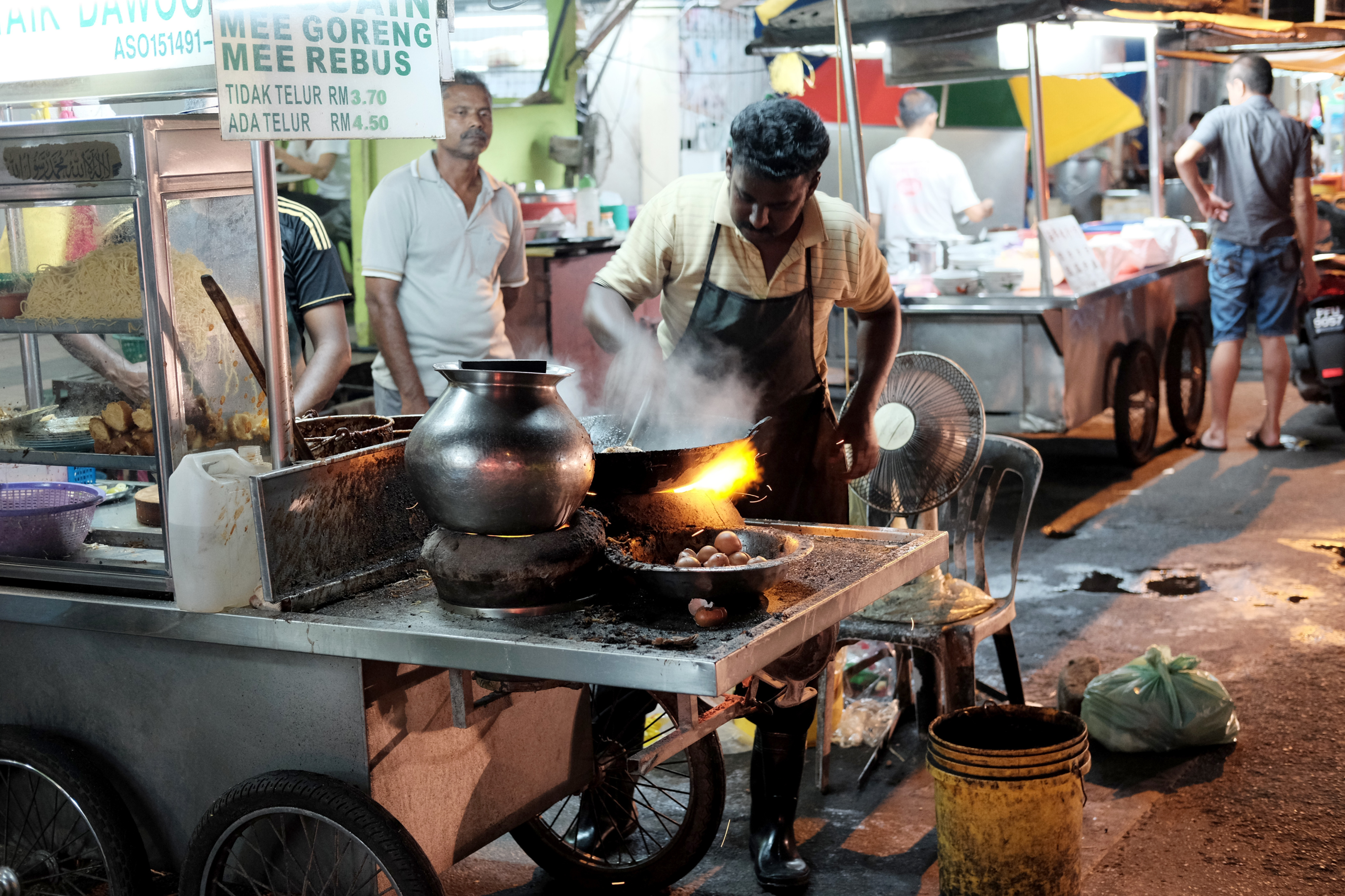 The street food in Jelutong city, such as nasi kandar is an unique place by the night market