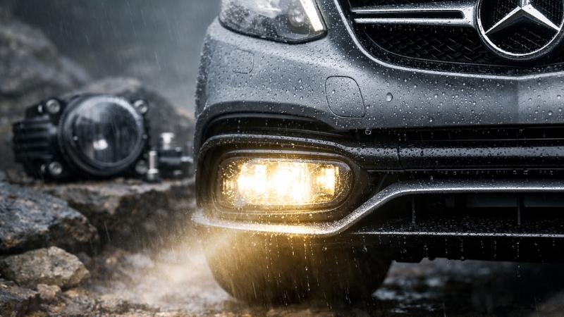 Front fog light of car illuminating the road ahead