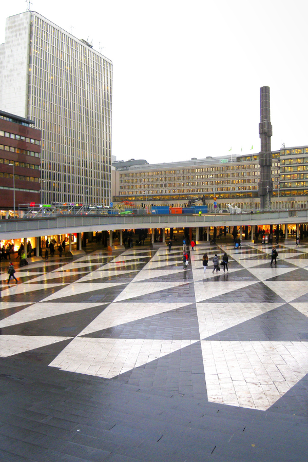 Panoramic view of Stockholm’s skyline with a striking church spire and colorful buildings along the water, reflecting Sweden’s design vision, wood traditions, and the evolving priorities of the furniture industry showcased at Stockholm Design Week.