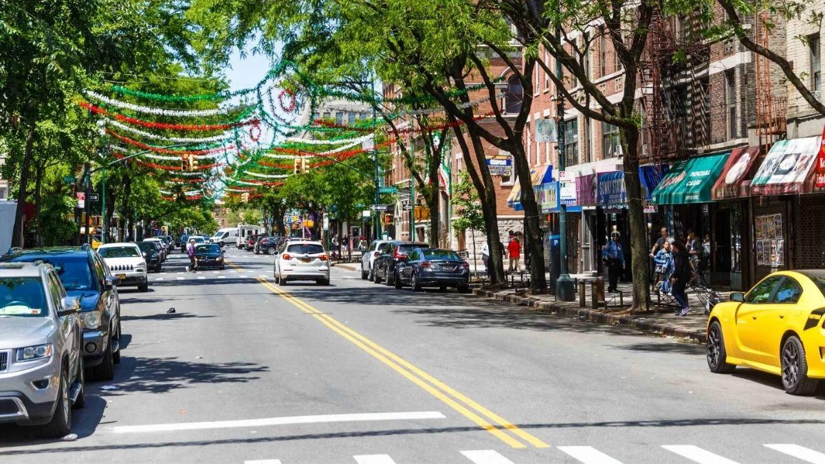 Arthur Avenue offers festive banners over a city street