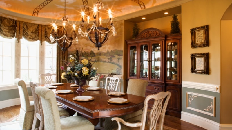 A recangle dining table with perfect light fixtures according to the focal point