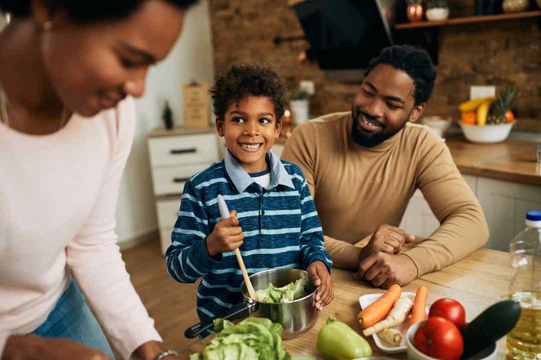 5 Top Reasons to Choose Viridian: A family preparing a healthy salad, inspired by Viridian's commitment to purity and wellness.