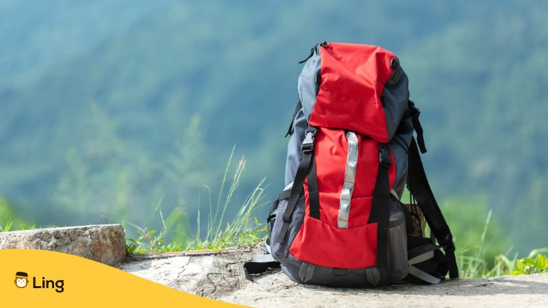 Hiking backpack travel gear on mountain.