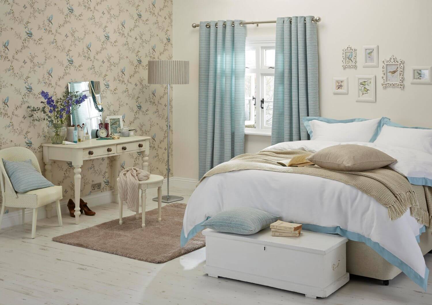 feminine Classic Country Bedroom with duck egg blue, cream colour and vintage ornithology giving an elegant yet vintage feel to the space