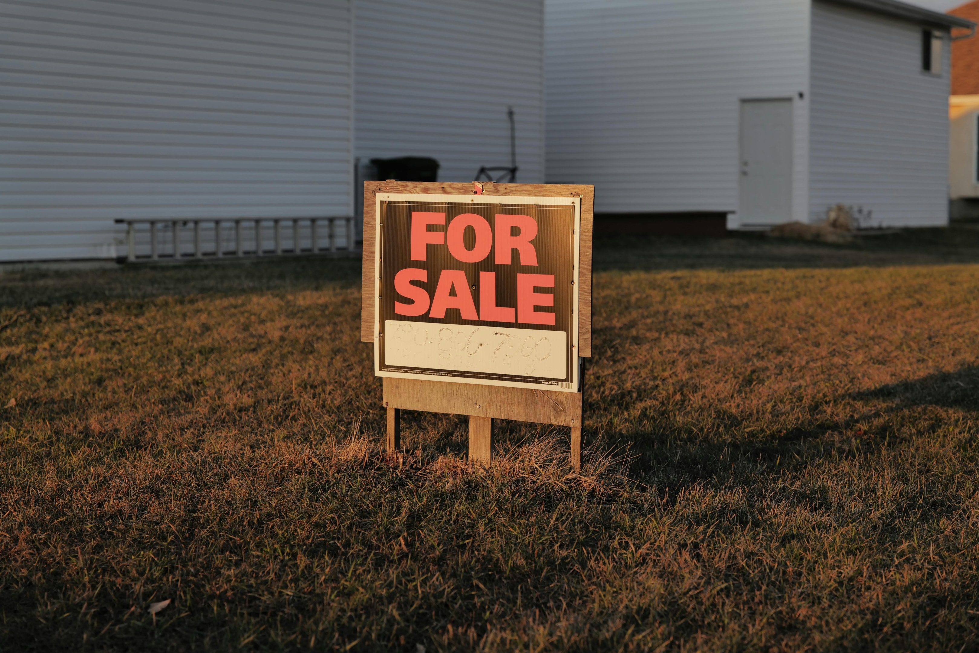 For sale sign in front of property that has passed through probate and is listed on the MLS.