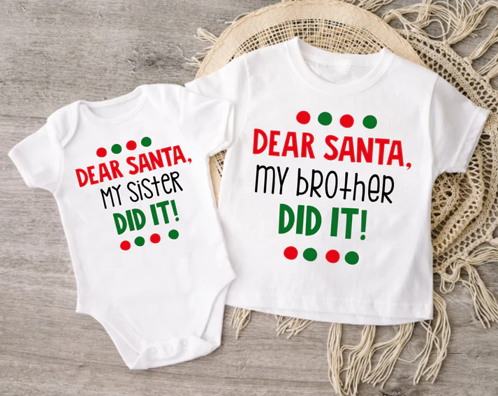 white bodysuit and tee Christmas outfits with the words "Dear Santa, my sister/brother did it!" printed on them in red and green