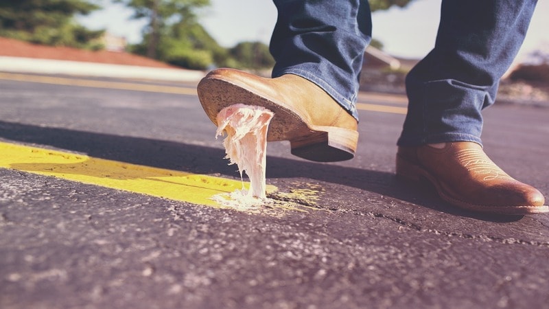 Rubber sole on shoes with chewing gum underneath