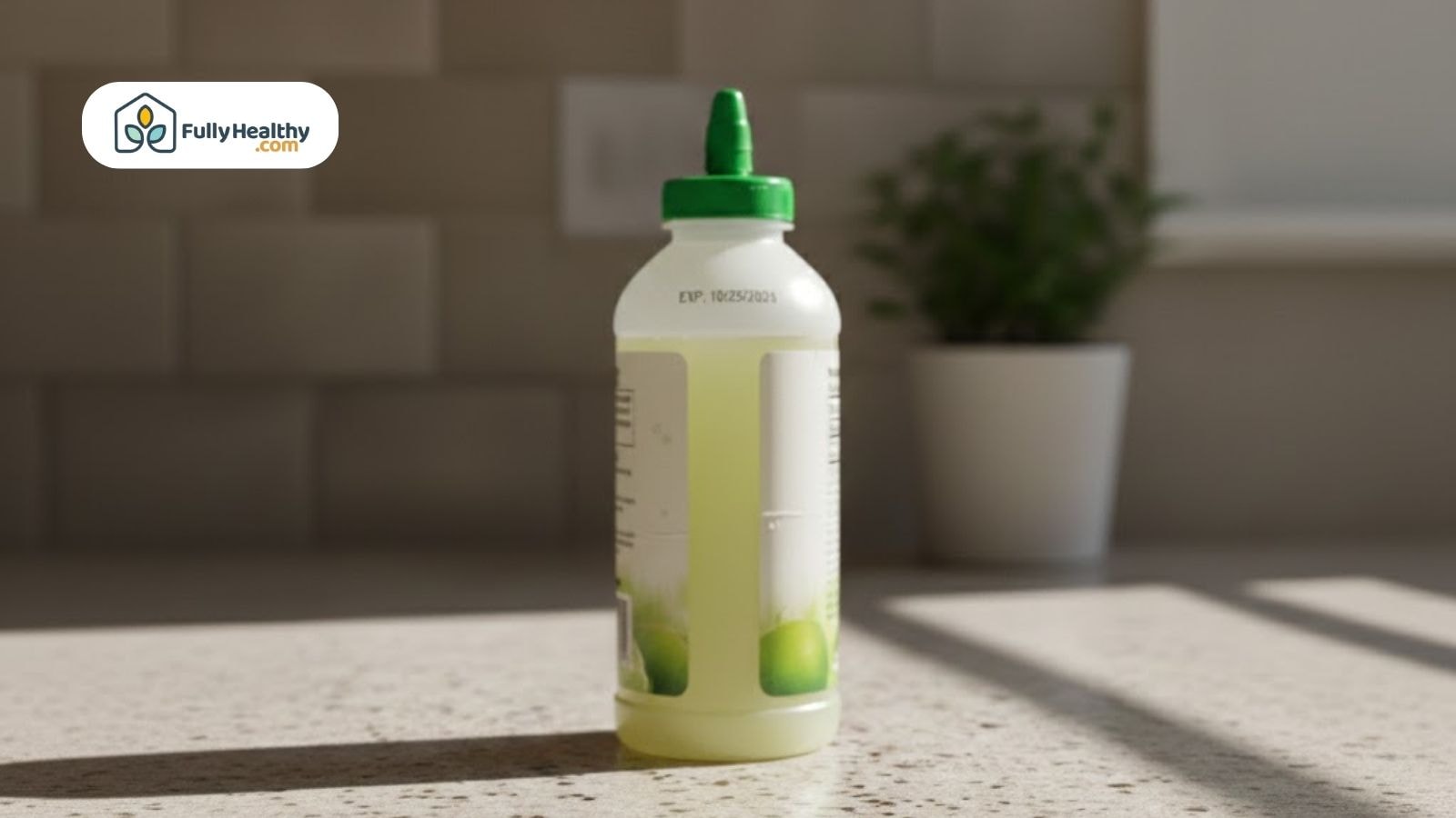 Store-bought bottled lime juice on a counter with visible expiration date.
