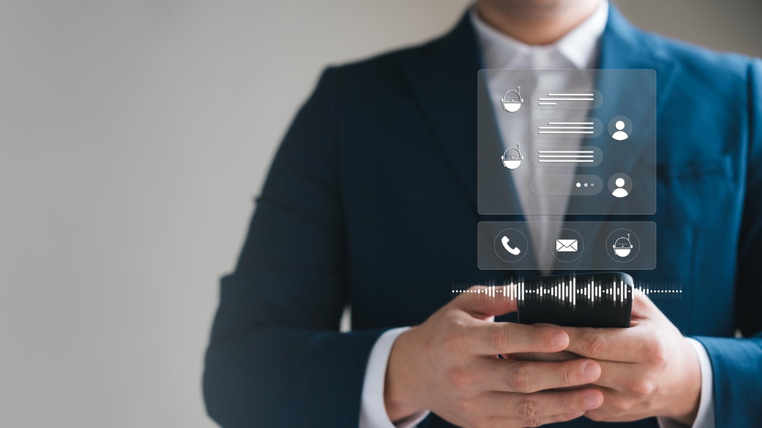 A businessman in a suit using a smartphone with floating digital communication icons, including messaging, call, and email symbols. This showcases advanced Cloud communications and Business VoIP providers facilitating efficient remote work and collaboration.