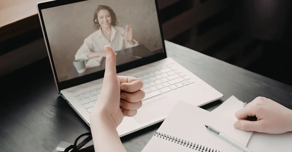 OnlyFans creator consulting a professional while following a tax guide.