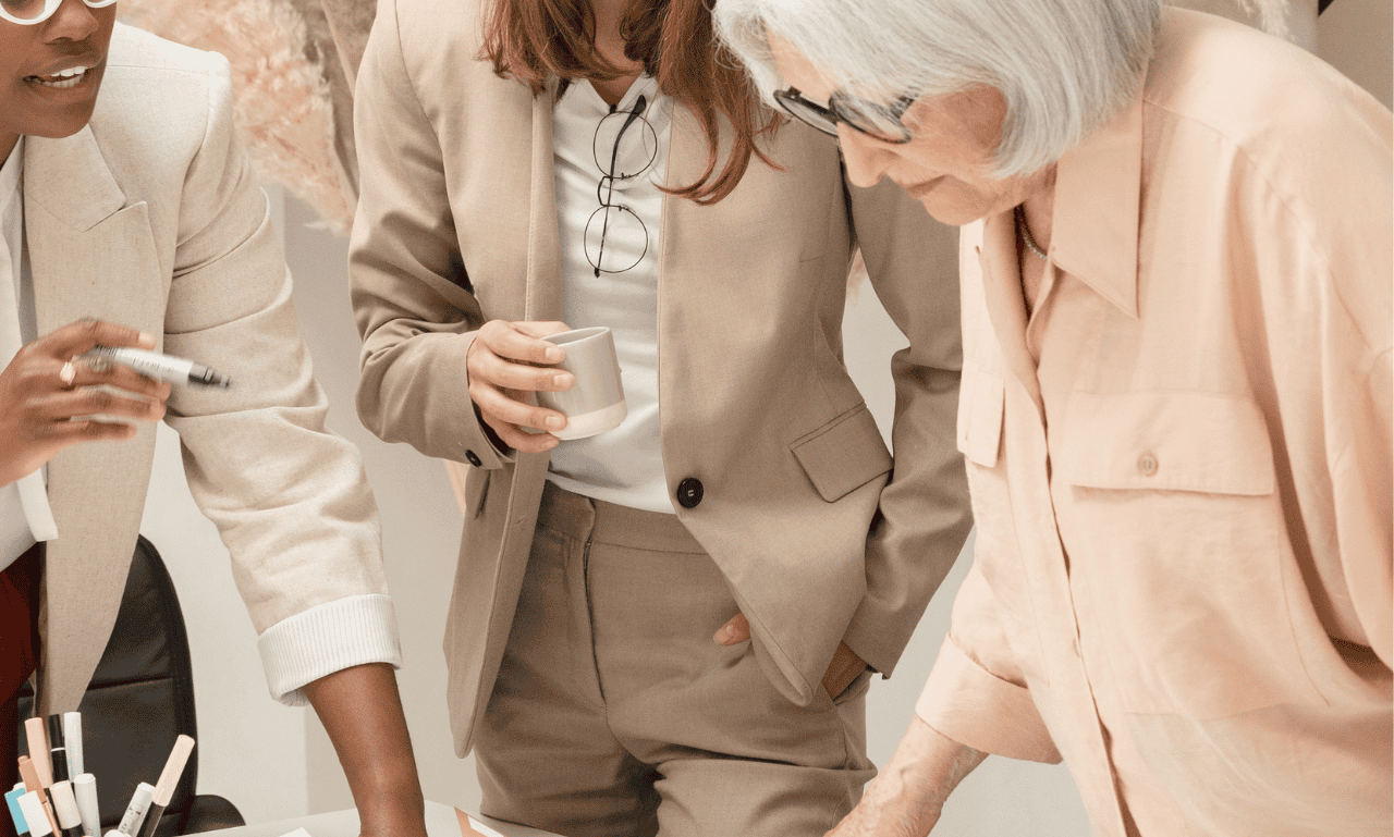 A group of women with different personality traits at the office working together.