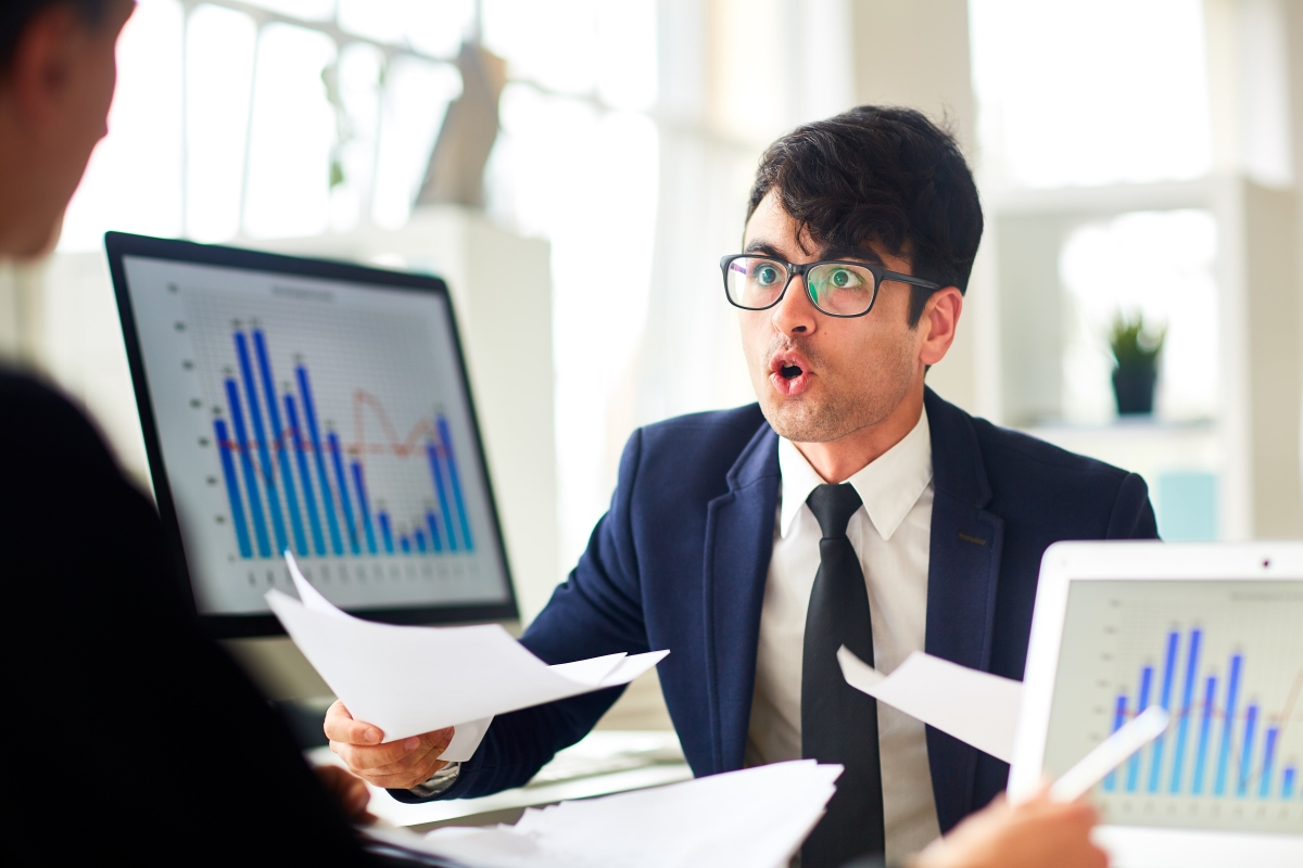 Two men talking about financial wellbeing 