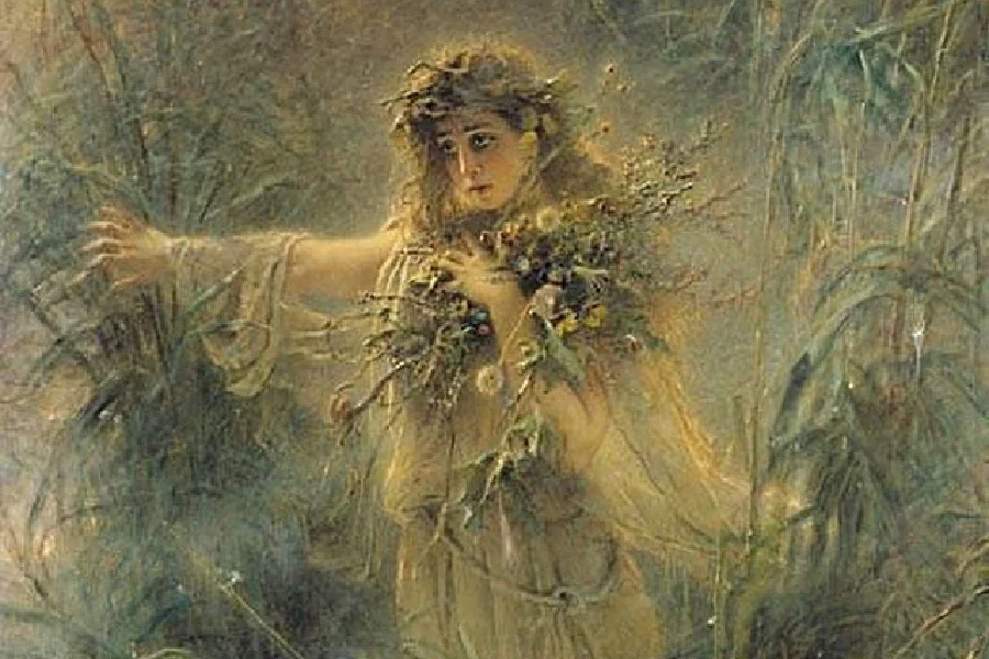 A young Cerridwen holding wild flowers to her chest while holding back tall grass.