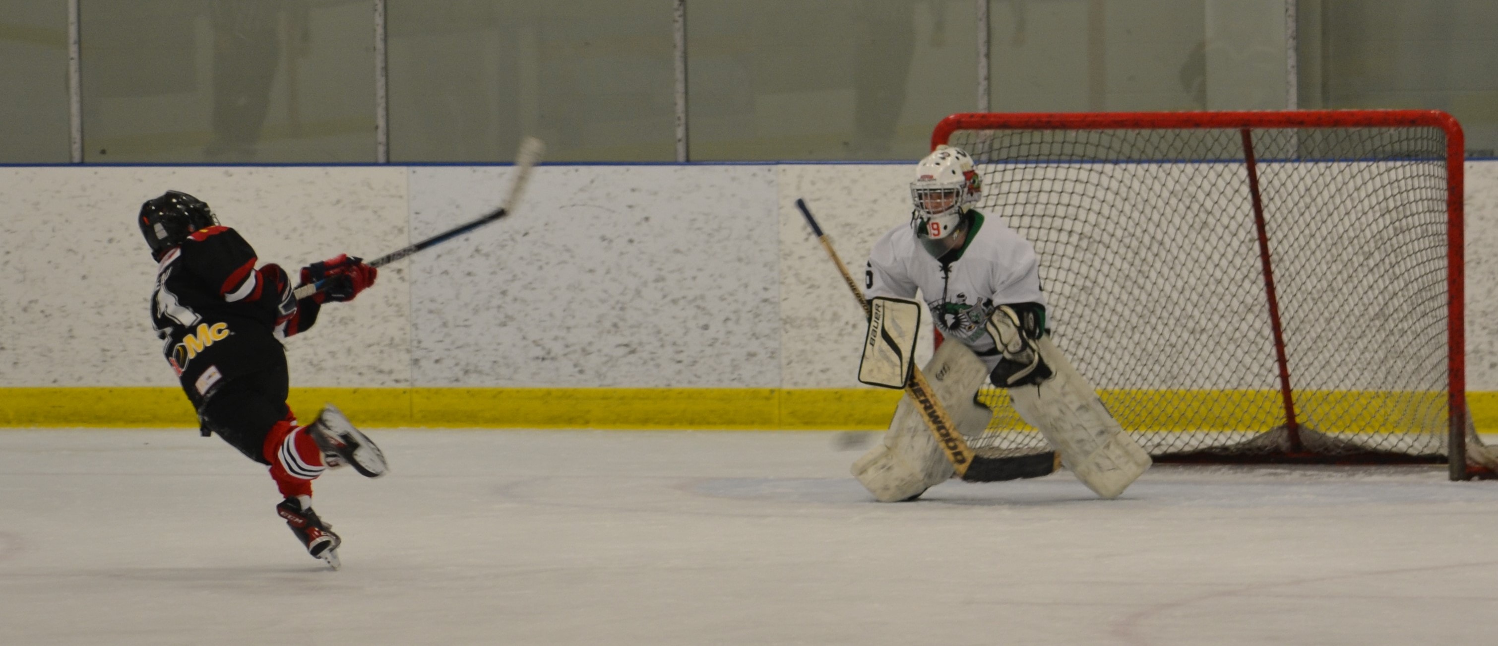 Max playing defence on teams taking a shot on net. Only an Edge on the ice. Can you see the puck?