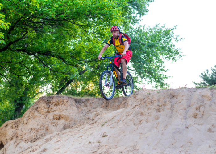 Mountain biker riding on a challenging terrain