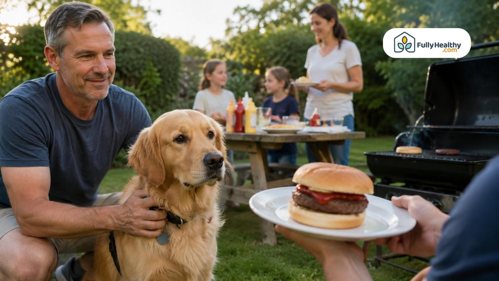 Owner keeping golden retriever away from ketchup burger at backyard barbecue