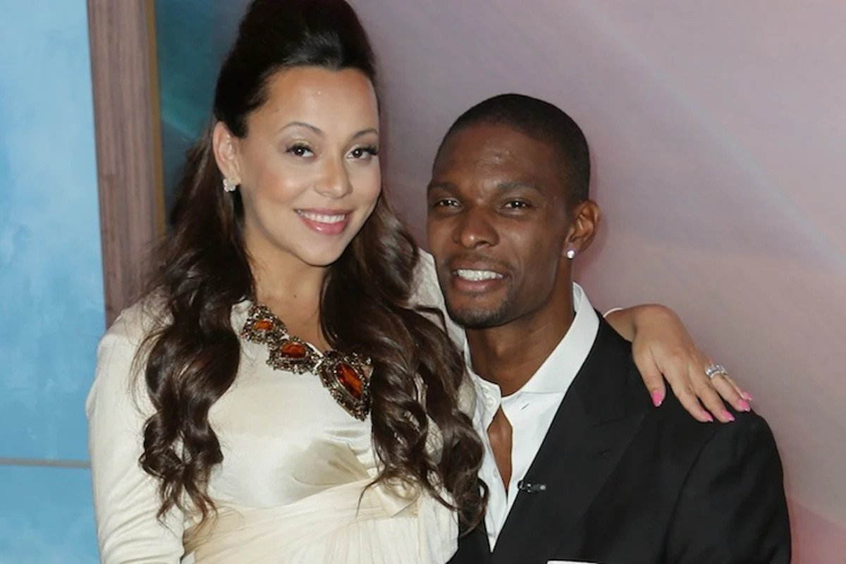 Adrienne Bosh and Chris Bosh (Photo via Getty Images)