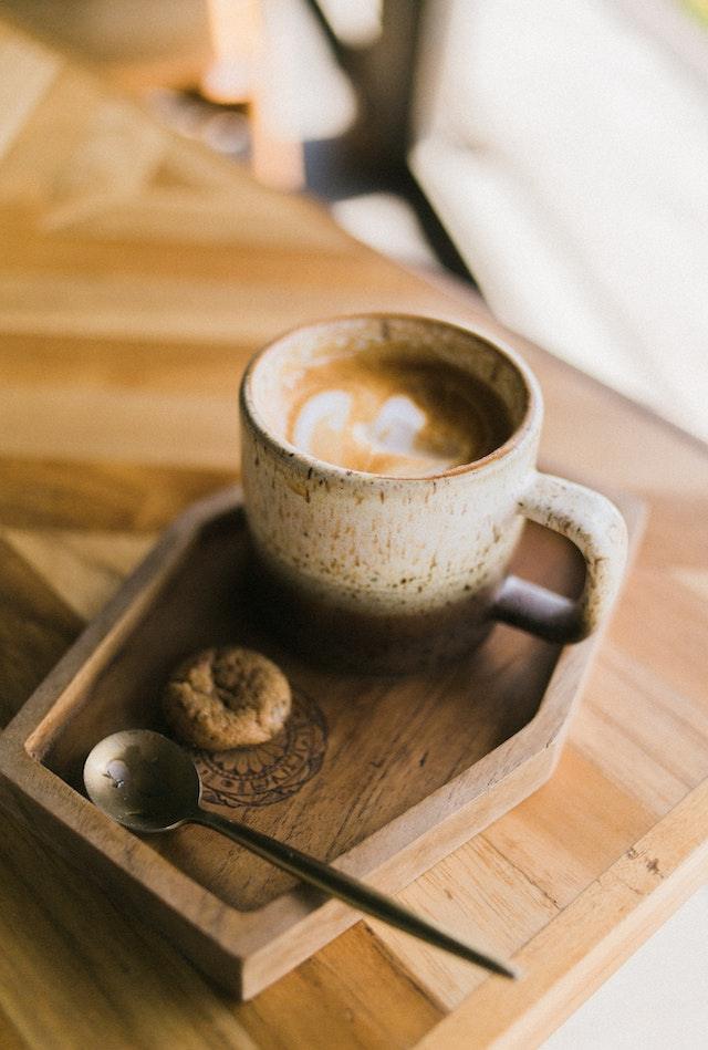 coffee sitting on table - abundance and scarcity mindset 