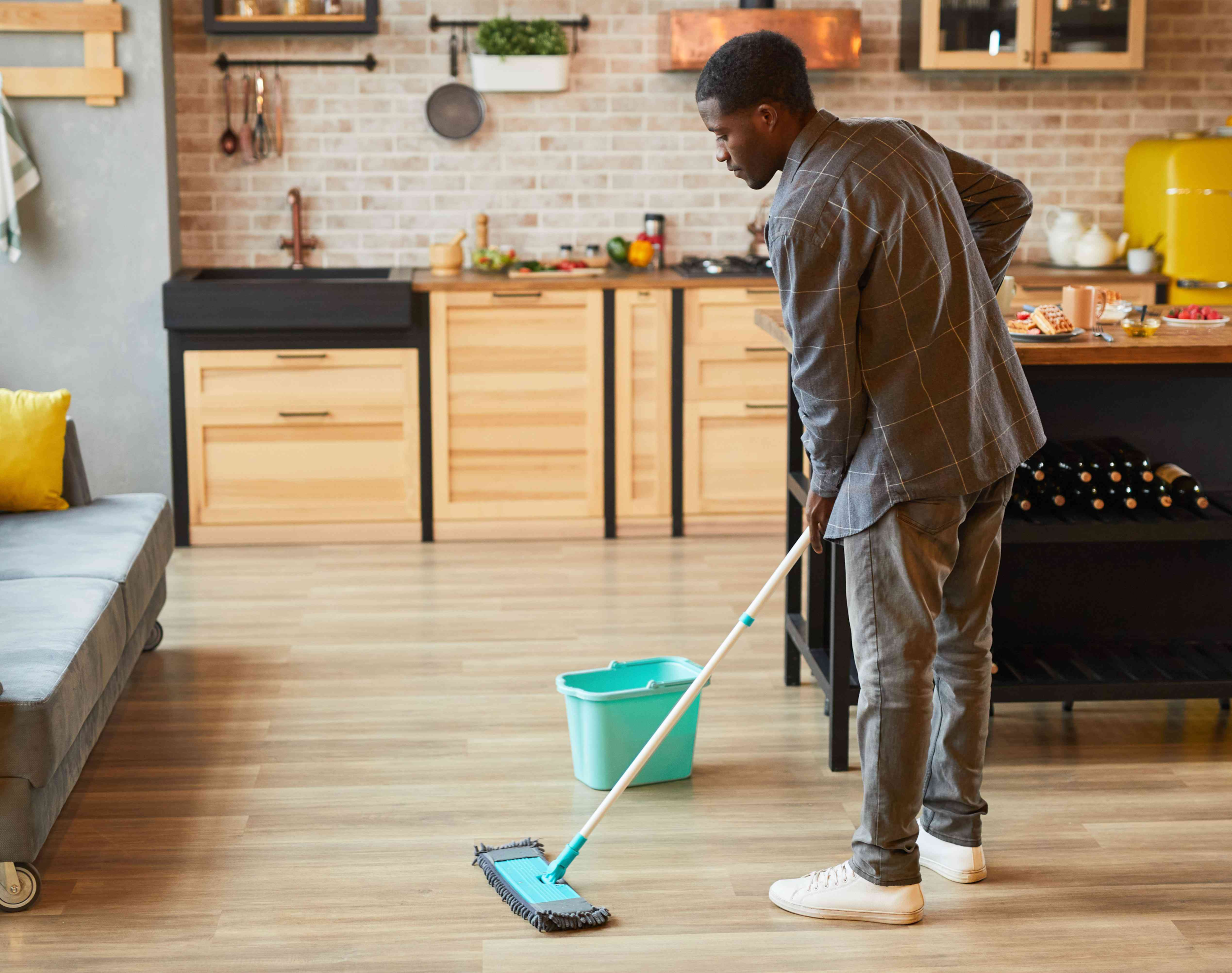 utilize a hardwood floor cleaner 