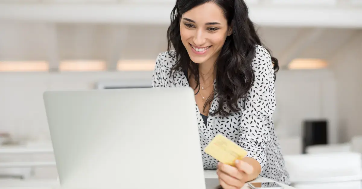 Woman paying her CP14 notice balance online before the deadline.