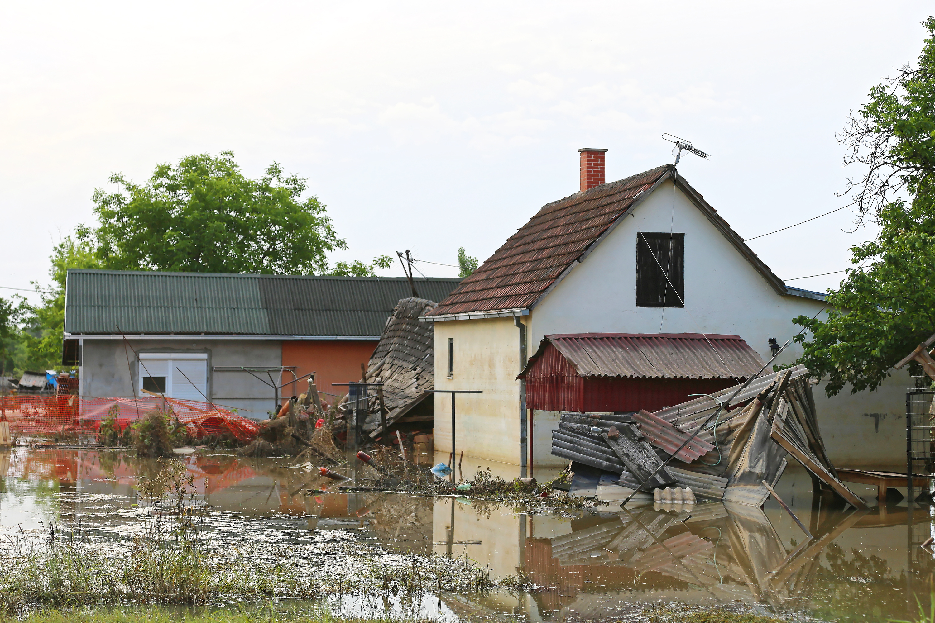 Heavy rain or storm surge causing flood damage to property.