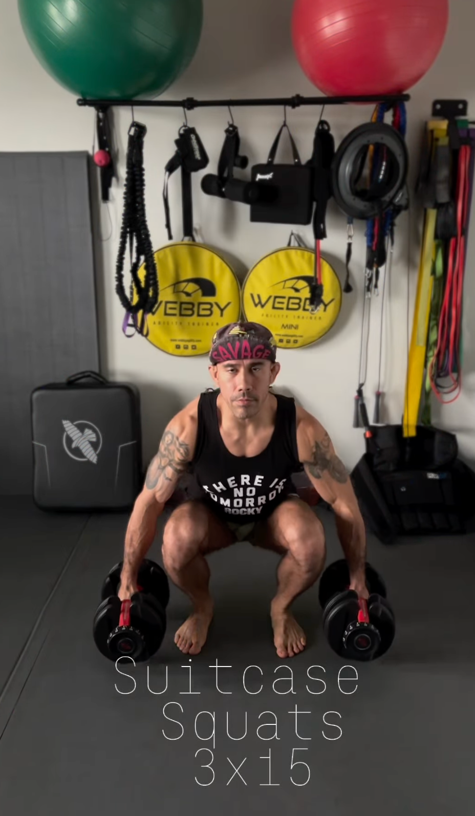 This leg workout has your feet hip width apart on the starting position with a dumbbell in each hand.