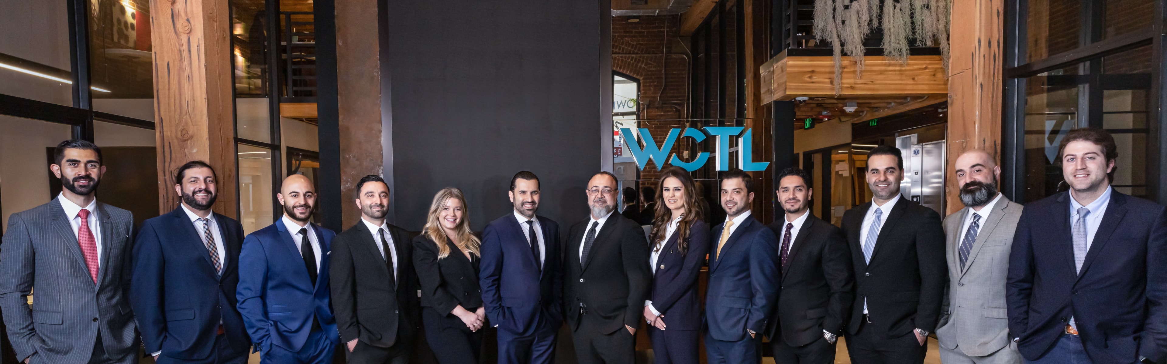 A professional personal injury lawyer discussing a case with a client.