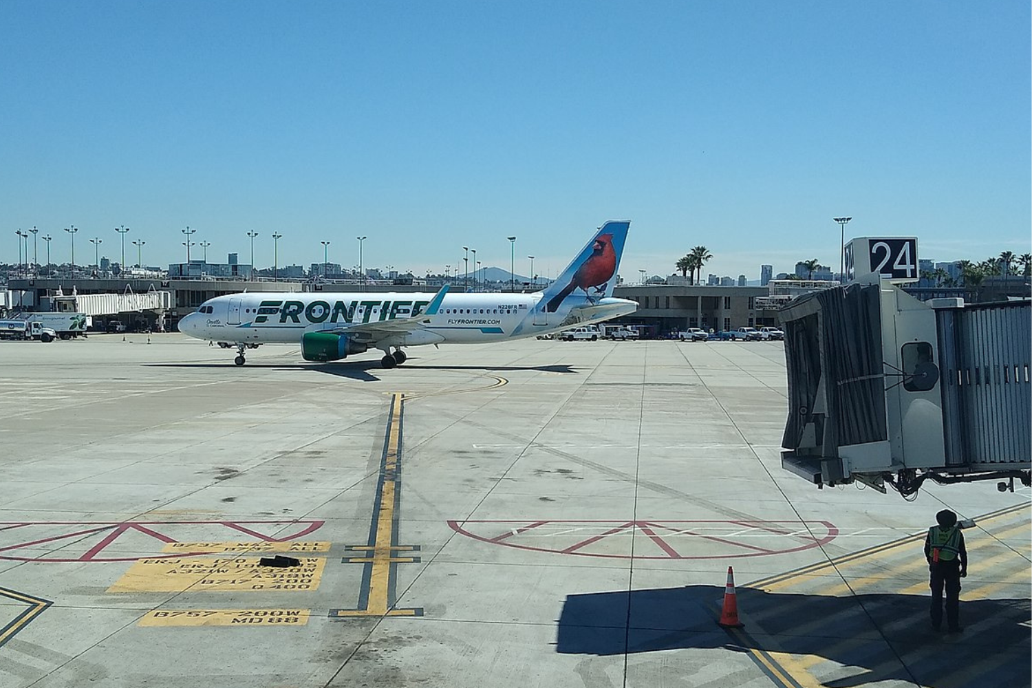 a white frontier flight at the airport