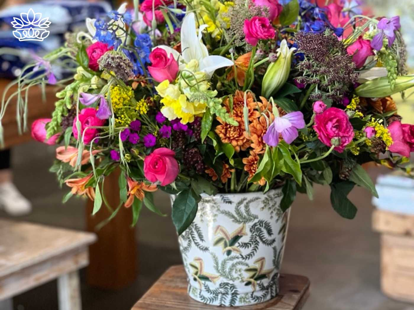 Elegant flower arrangement from the Flowers By Type Collection at Fabulous Flowers and Gifts, featuring a vibrant mix of roses, lilies, and other blooms.