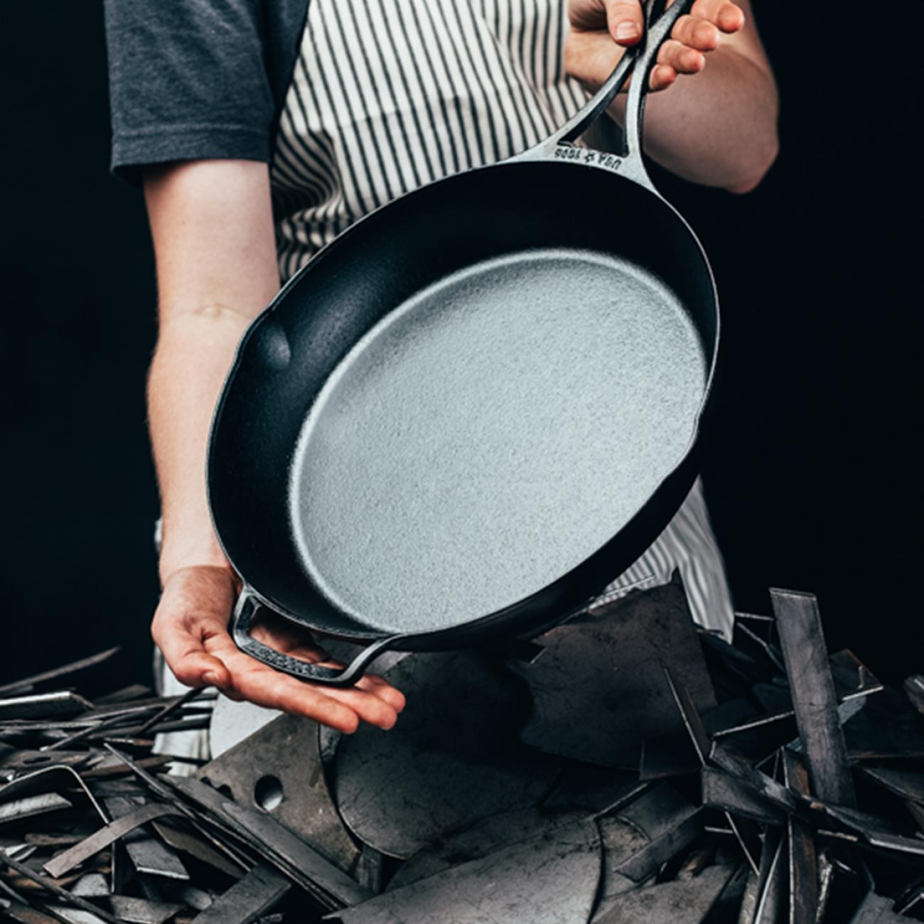 A perfectly seasoned cast iron pan. The surface is smooth and glossy from the layers of polymerized oil.