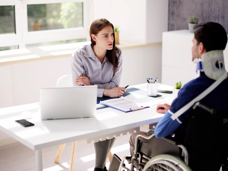 An image of a person after a truck accident looking into their insurance claim for maximum compensation.