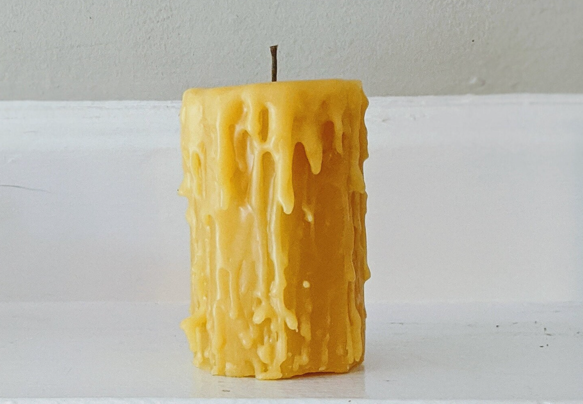 Beeswax pillar drip candle