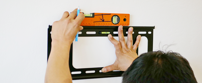 Make sure your bracket is straight before making your drill holes and placing the TV on the wall.