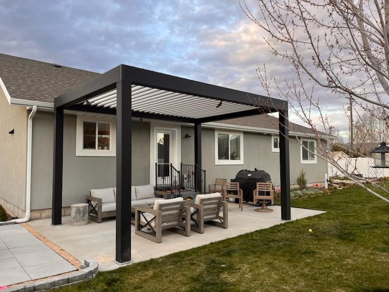 Freestanding pergola in backyard giving enough room for lounging area