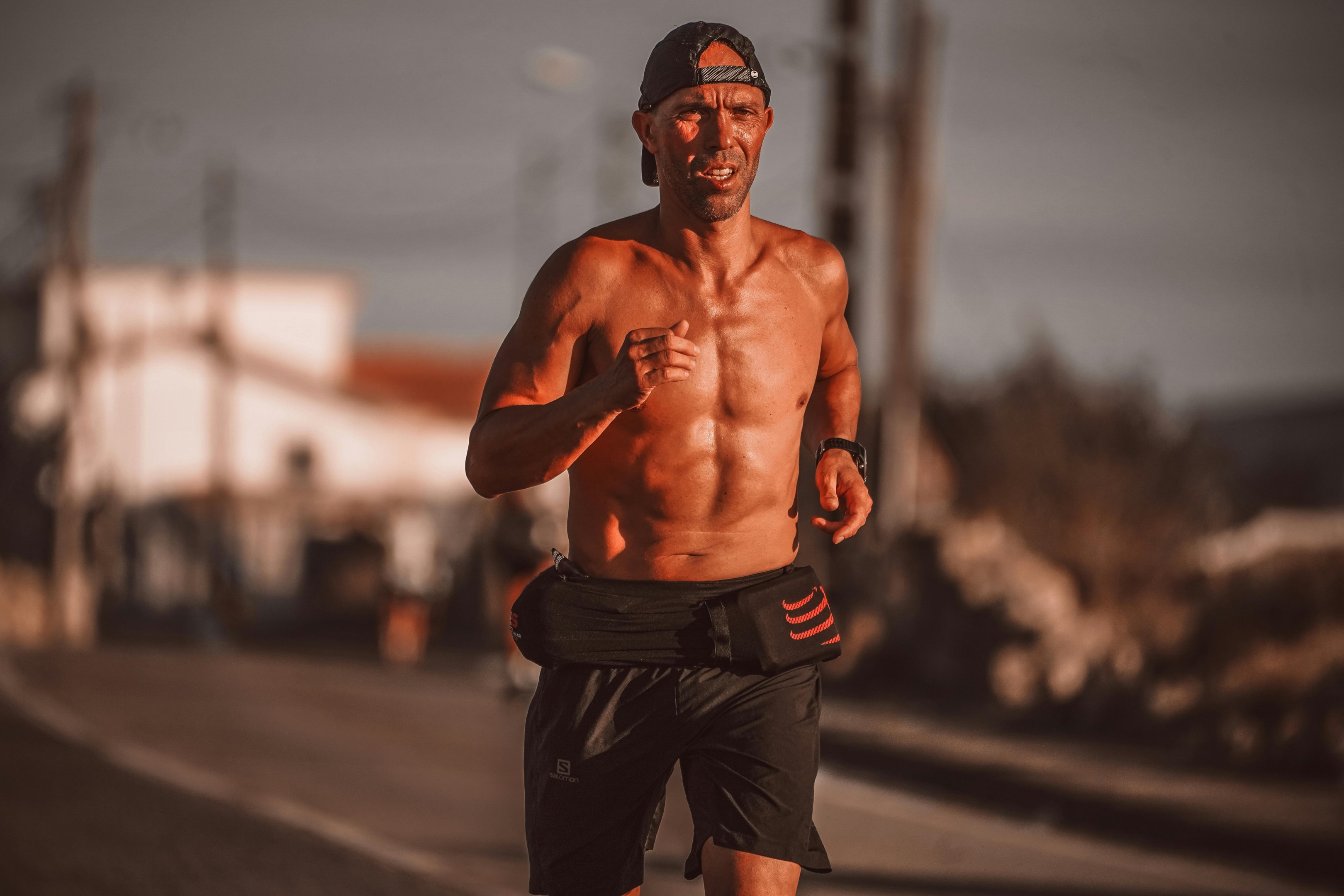 Photo by RUN 4 FFWPU: https://www.pexels.com/photo/a-muscular-man-running-a-marathon-18409440/