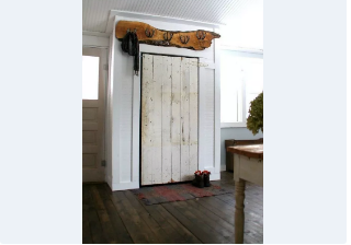 Addding a barn door closet on top of an electric panel