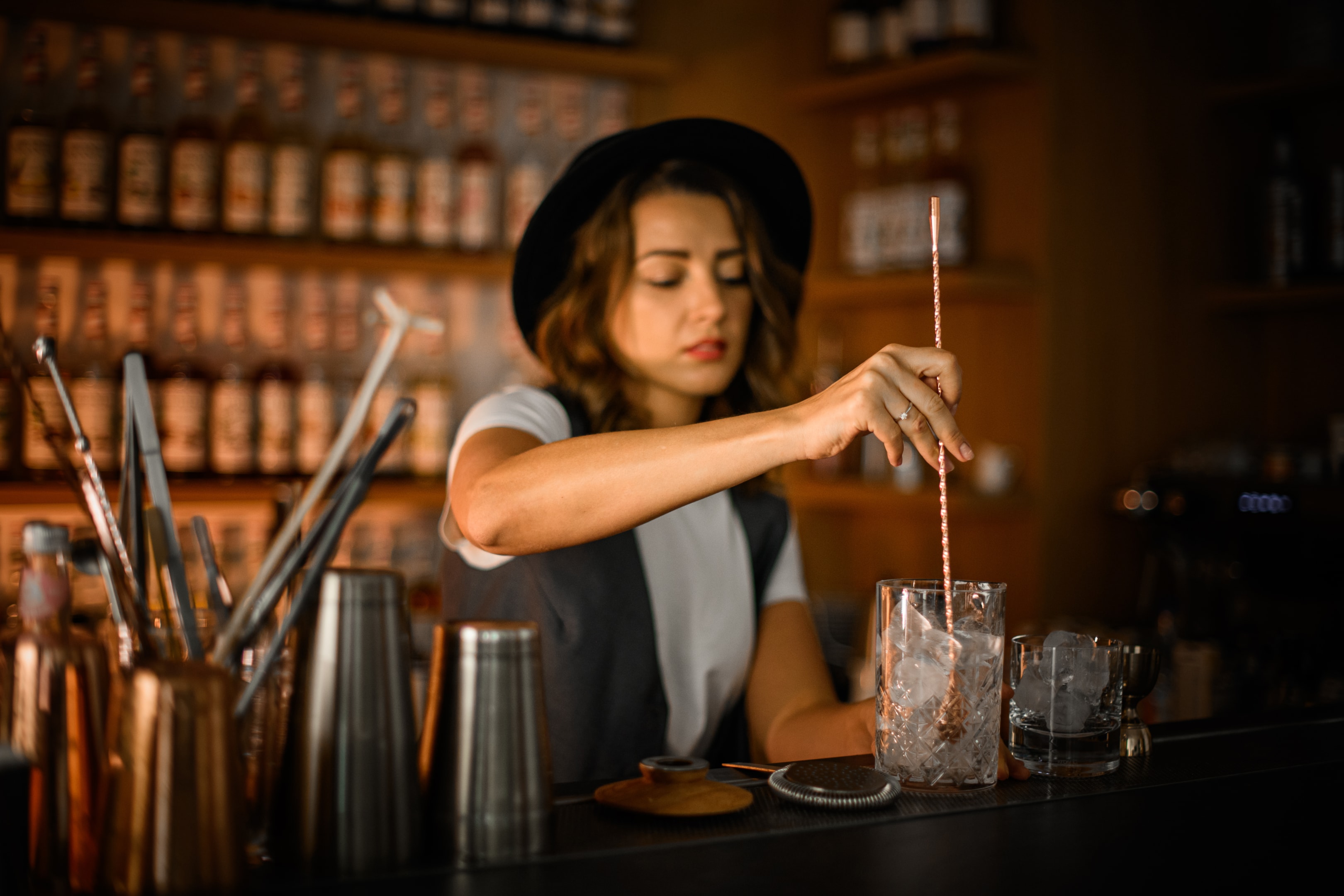 Bartender in bar restaurant making mocktail mixed nonalcoholic drink