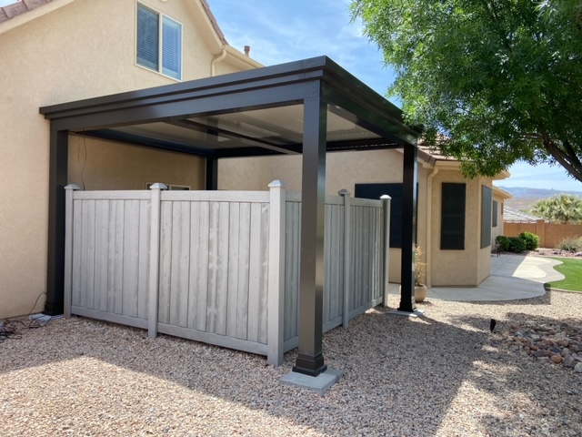 house with pergolas  on covered patio